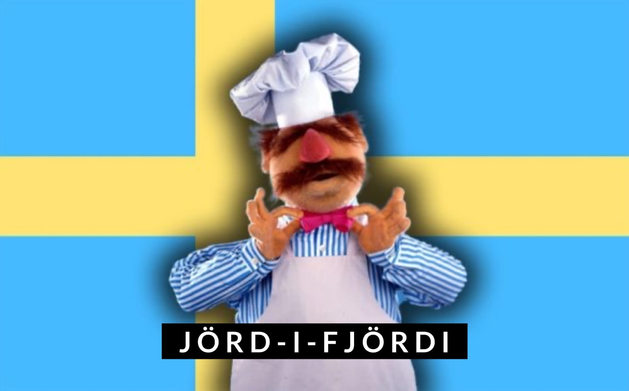 Svenska kocken från mupparna justerar sin fluga och står framför en svensk flagga. Texten under honom är ”Jörd-i-fjördi”.