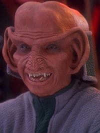 A photo of a smiling Rom, the fictional character from Star Trek: Deep Space 9. He is of the fictional extraterrestrial species Ferengi, has very big ears and looks somewhat like the pepper.