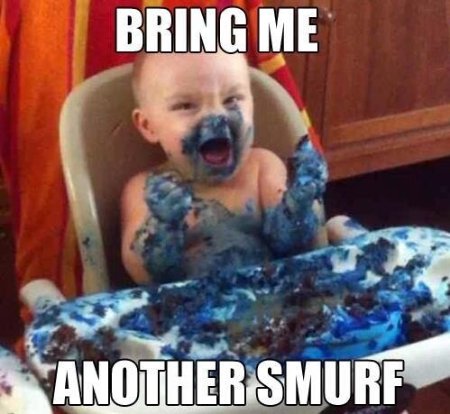 A baby looking frantically excited after eating something sweet and big and blue (one might assume cake). Their face, body and table have become absolutely covered in the sticky mess. The baby is in their booster seat, looking at the camera and yelling with clenched fists, arms and hands also covered in blue goo.

Across the image are the words: "Bring me another smurf!"

